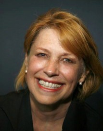 Headshot of faculty member Joan Brooker closeup of face smiling at camera