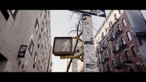 Still from Yoko Chen's short essay film shows the walk signal at a nyc intersection