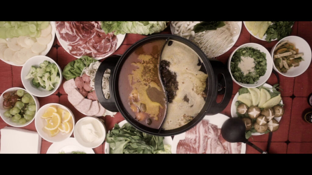 delicious looking spread of food laid out for a hotpot meal.