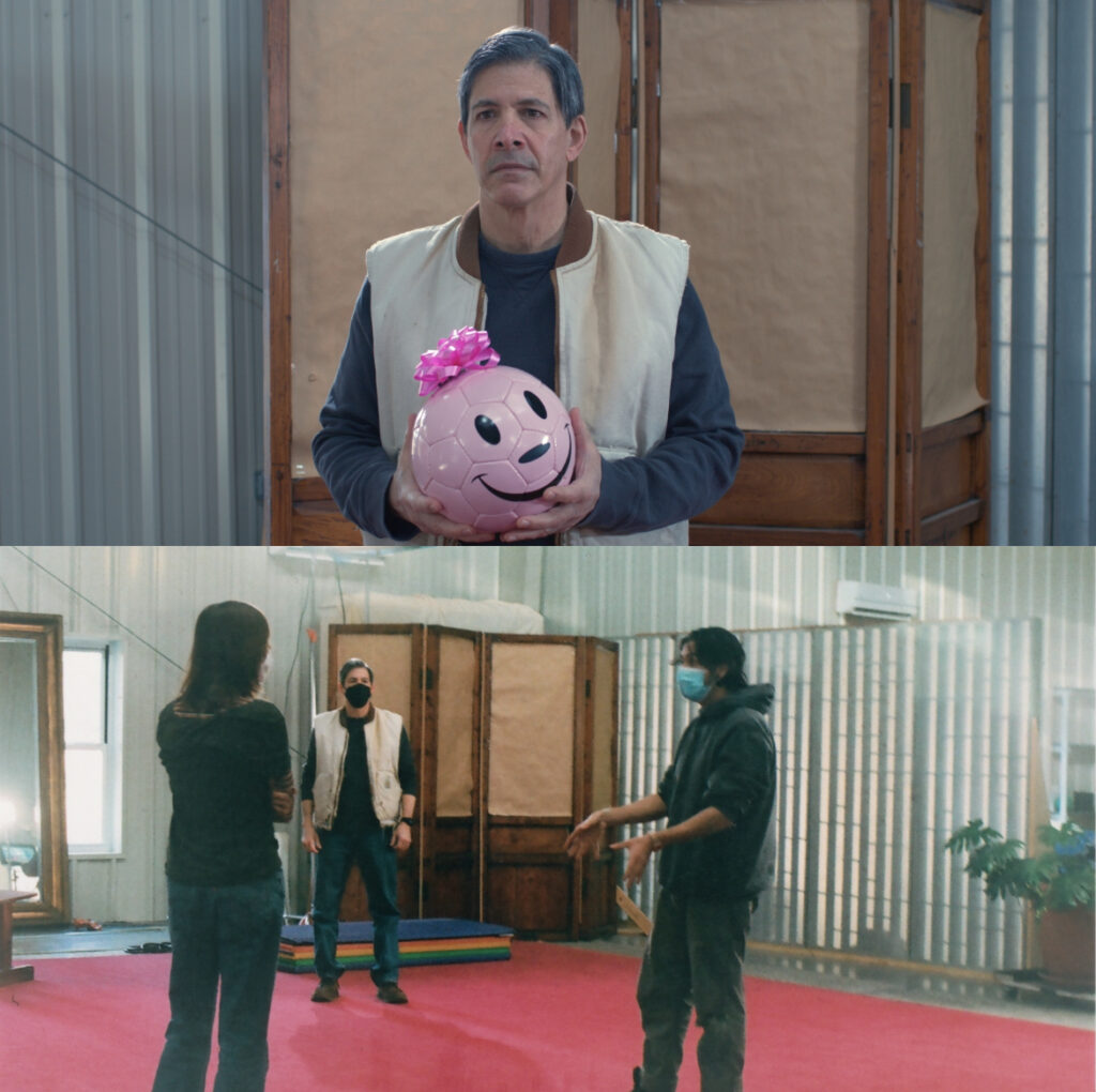 Two photos stacked on top of each other. The top photo is a still image from Steven's film shows a person holding pink soccer ball with a smiley face and a pink bow on top. The bottom photo is a 'behind the scenes' shot showing the same person wearing a covid mask interacting with two other crew members, also wearing masks. 