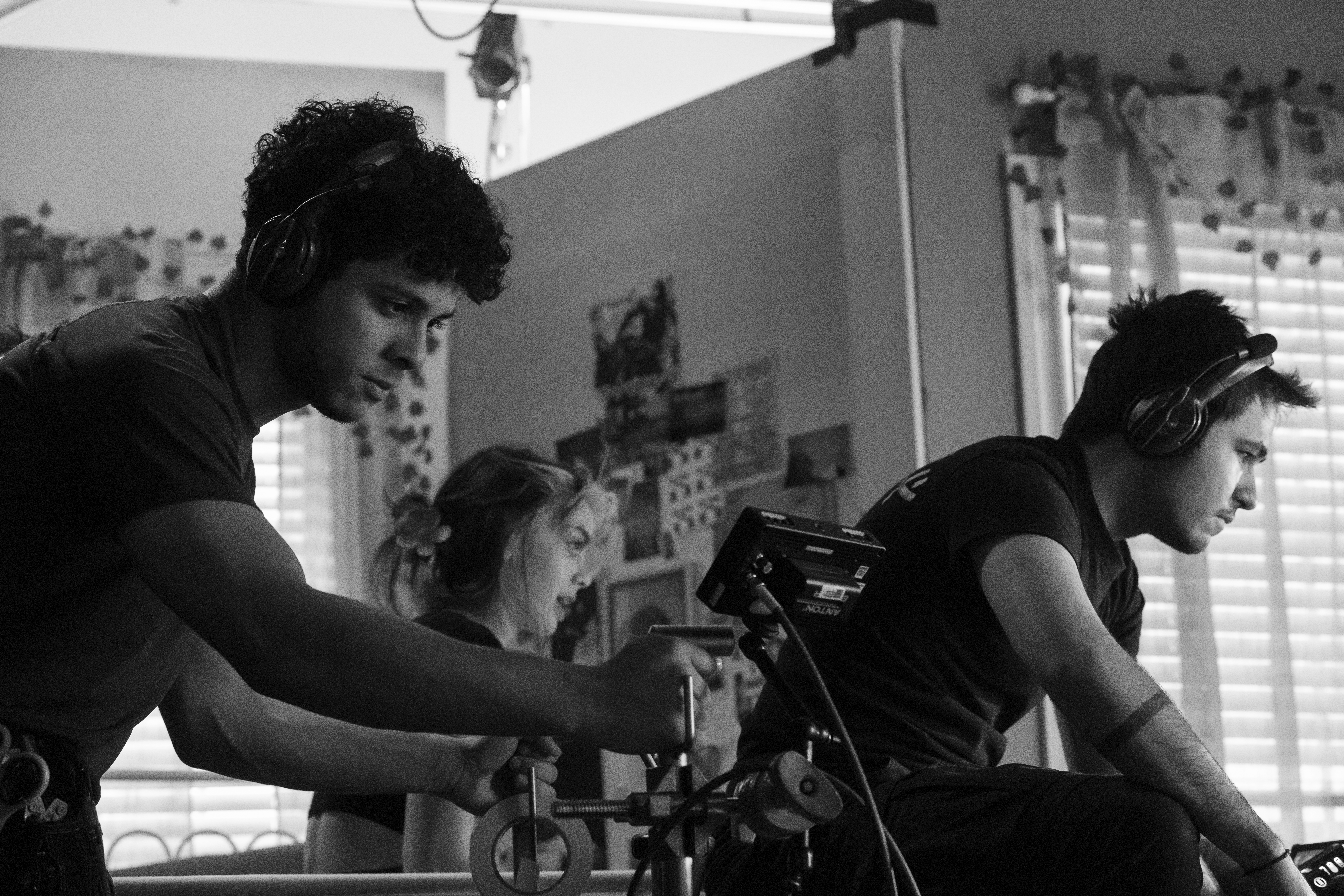 behind the scenes on Liane's film shows two crew members preparing for a shot.
